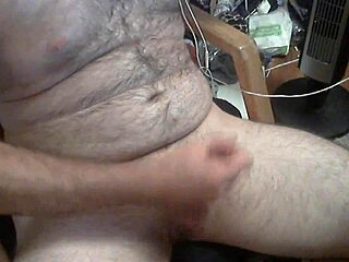 She strokes her solo handjob to climax.