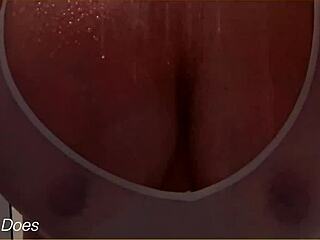 The wife bathes in the shower, her wet shirt clinging to big tits, homemade voyeur captures every detail.