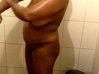 Mallu aunty enjoys a relaxing bath in the tub