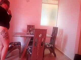 i'm watching the tattooed woman masturbate while she does chores at home