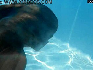 Irina Cage's Busty Underwater Adventures With Intense Public Exposure. Russian Pornstar Dives Deep For Blonde Girlfriend Action.
