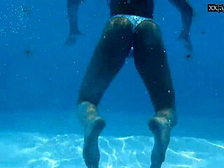 Irina Cage's Busty Underwater Adventures With Intense Public Exposure. Russian Pornstar Dives Deep For Blonde Girlfriend Action.