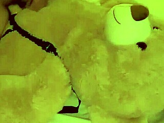 wife rides teddy bear's strap-on cock in this reality fetish scene with toys and orgasm