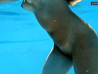 Irina Cage's Busty Underwater Adventures With Intense Public Exposure. Russian Pornstar Dives Deep For Blonde Girlfriend Action.