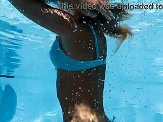 Beautiful hungarian pornstar candee licious swims naked in the pool, showing her petite body and small tits.