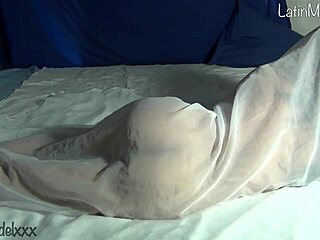 why does the silly latina girl strip naked under the sheets for the photographer?