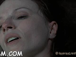 Tied up naked hotty sucks cock in hardcore BDSM waiting fearfully for her next intense blowjob session!