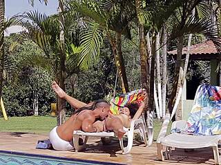 Giovana bombom sucks mauro araujo's monster black cock by the pool.