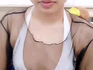 asian stripper teasing with clothes ripped, feeling so aroused and excited