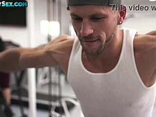 Muscular hunks bang bareback in public gym