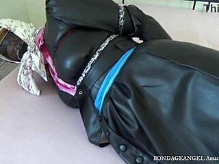 scarf bondage session with a mature woman in leather