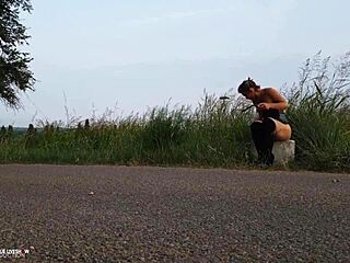 shooting porn on the edge of a road with shaved pussy and small tits exposed