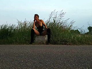 shooting porn on the edge of a road with shaved pussy and small tits exposed
