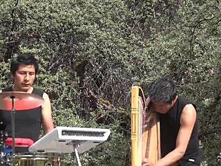 Peruvian women perform traditional dances.