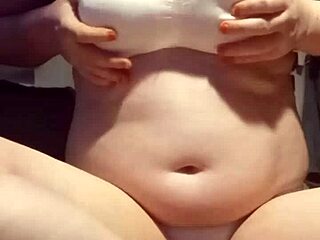 Petite amateur feels horny playing with big natural tits