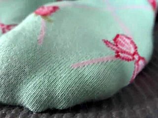 restrained woman tickles feet sole