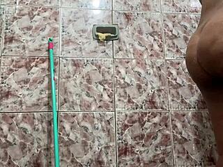 Morena with huge tits shows off in the shower, teasing her pussy