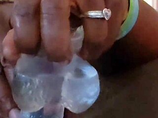 Ebony woman pleasures her big ass solo