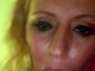 My wife gives an early morning blowjob in our amateur video