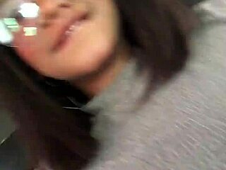 Perfect breasts exposed in a public car scene with a latina colombian woman outdoors.