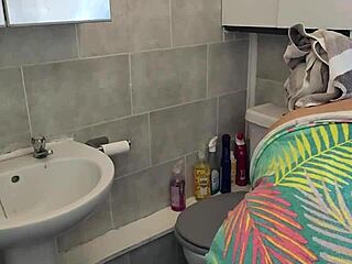 cleaning bathroom topless with big boobs