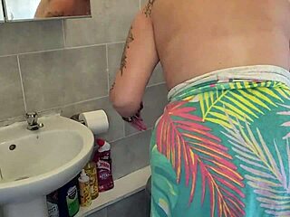 cleaning bathroom topless with big boobs