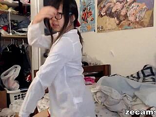 Young Asian teen with small 18+ tits goes wild on webcam for first time