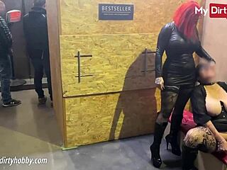 busty redhead feels intense pleasure jerking cocks in gloryhole