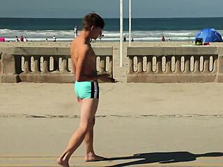 Twink Dancing On The Beach In Speedo