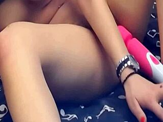 girl plays with two dildos on webcam