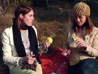 lesbian couple kisses then straps on