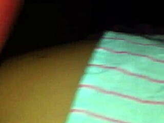 The wife enjoys a latex fuck from her lover in doggystyle position