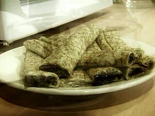 Blonde bimbo plays with cream and man's dick in kitchen until cumshot!