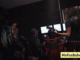 Watch this natural busty brunette slut nia bleu fucked by brett maker while a band is rehearsing