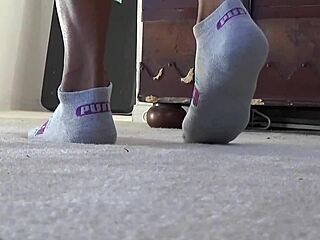 Ebony Cougar's Passionate Puma Socks Fetish Ignites Intense Emotions