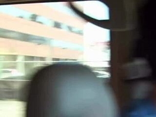 Two girls giving blowjob in group setting