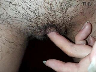 She fingers her wet pussy before studying, reaching an intense orgasm.