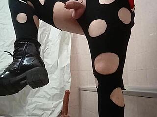 Travesti uses toys for detailed play with dildo