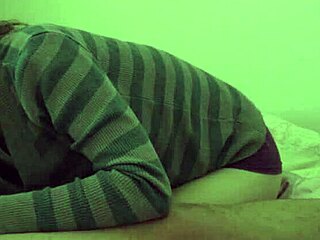 Smoking a cigarette while sucking dick in bed