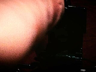 Mature woman experiences intense session with sex machine in leather