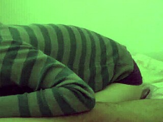 Smoking a cigarette while sucking dick in bed