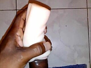 he fucks the fleshlight with his big black cock, building up to a massive cumshot in solo caribbean session