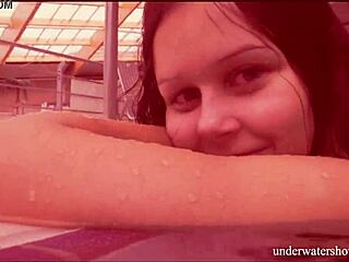 Brunette babe Nata Szilva swims tight in pool