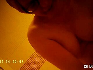 Spy Camera Catches Shower Nude Tits