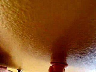 She moans as I fuck her ass with toys deep inside.