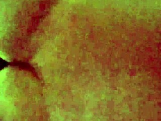 A black cock penetrates a big natural tits brunette in a doggy style while a neighbor watches.