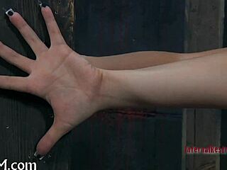 stuffing a cute european girl with a hard toy in bondage