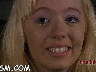 chick shackled in bdsm contest, sucking and fucking cock roughly.