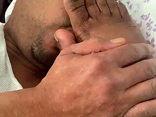 I'm sucking my wife's toes while she jerks me off with her feet fetish