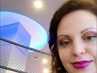 leather catsuit teasing in pantyhose and miniskirt femdom